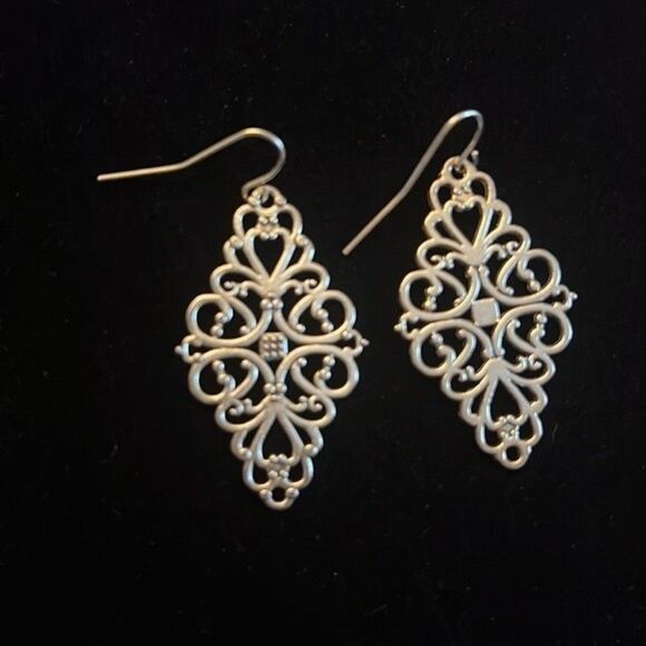 Handcrafted silver tone scroll earrings. - Picture 4 of 4